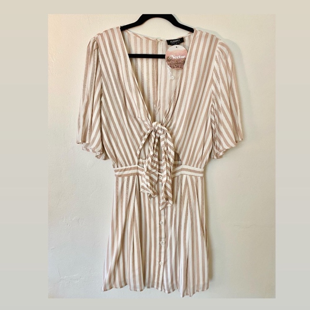 Pink and white striped front tie dress.